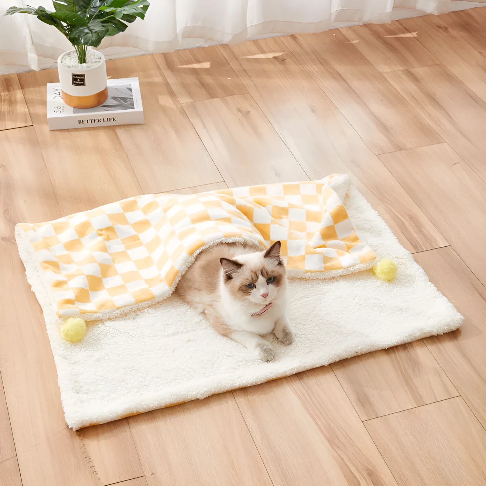 Plaid pattern pet blanket with fur ball decoration in green, pink, or yellow colours