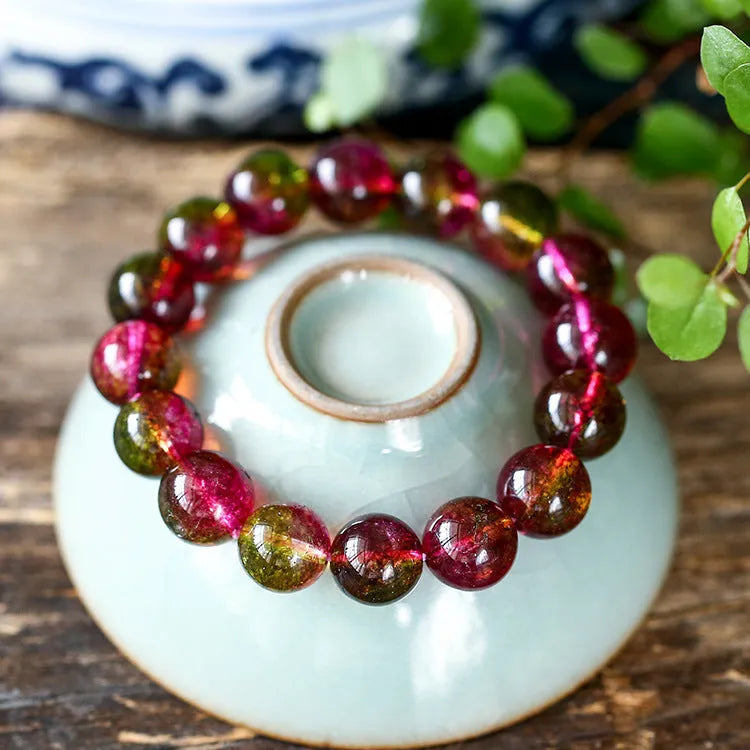 Handmade women's bracelet with pink and green watermelon crystal beads in casual pastoral style.