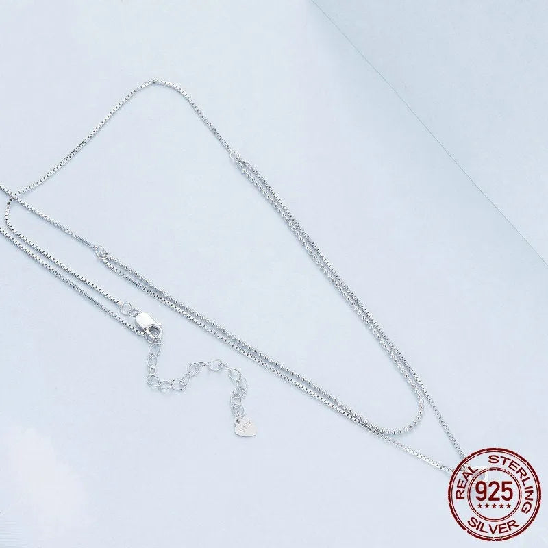 Women's double-layer sterling silver necklace with pearl chain design in silver colour