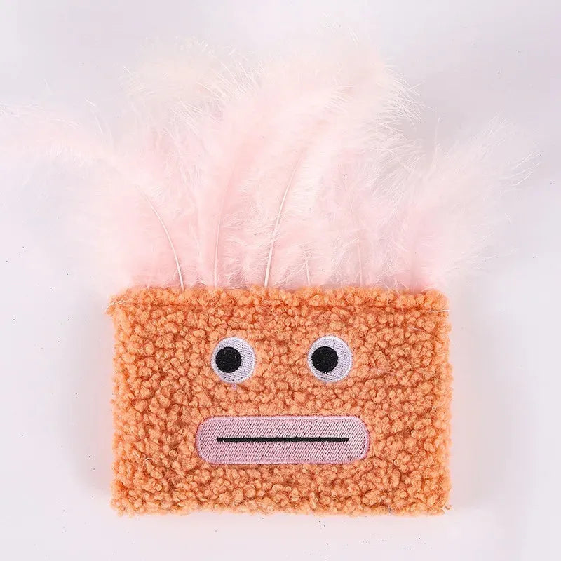 Colourful catnip plush toy shaped like an exploding head with a big open mouth