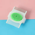 Multifunctional pet comb dog grooming tool in blue or green, compact size 8.5cm by 7.5cm by 2.5cm