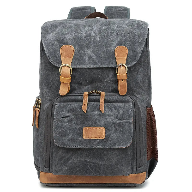 Khaki coloured canvas DSLR camera backpack with adjustable straps shown front-on.