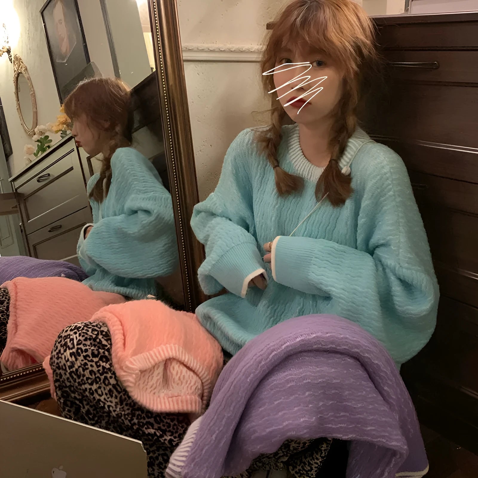 Women's loose-fit retro pullover sweater in lake blue, with regular sleeves.