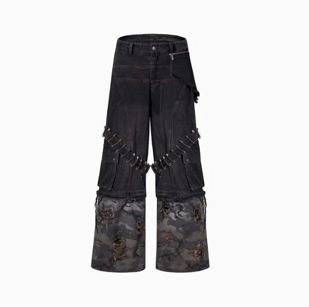 Men's grey cotton jeans with camouflage print, splicing panels, and decorative pin and ribbon details.