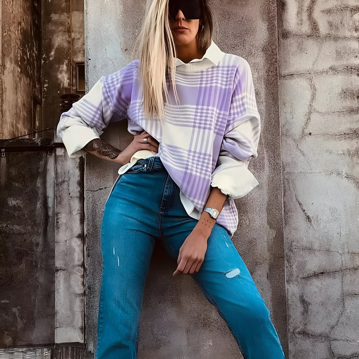 Lilac plaid print loose sweater with ribbed trim on mannequin