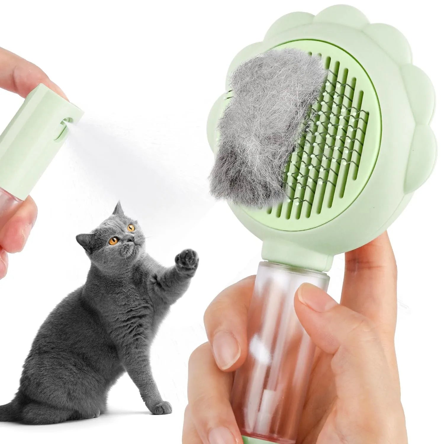 Grey, green, and pink spray cat brush with a release button and curved stainless steel bristles.