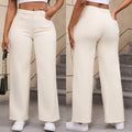 Women's apricot wide leg high waist jeans with straight cut on a hanger