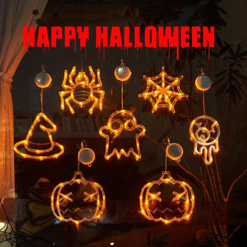 Halloween battery-powered LED window lights with suction cups showing spider, pumpkin and ghost designs