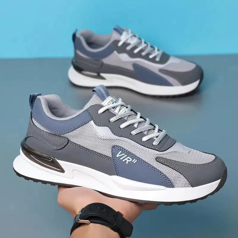 Men's colour block mesh sneakers in grey with lace-up closure and low-top design.