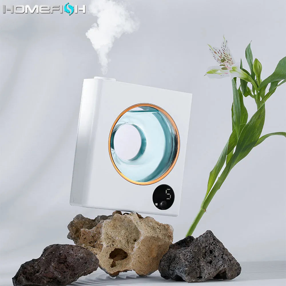 Small white wall-mounted automatic aromatherapy machine for essential oil diffusion.