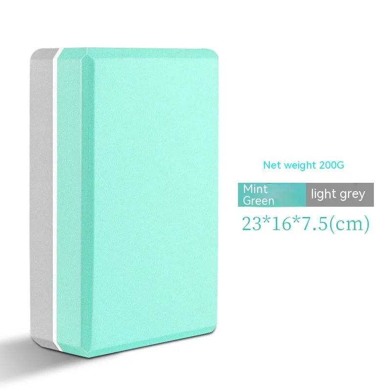 High-density EVA yoga block in mint green colour showing its rectangular shape and flat sides.
