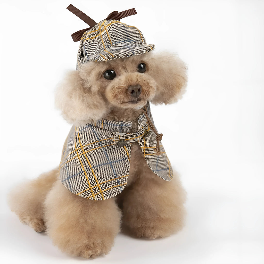 Camel-coloured cotton detective cloak costume for a dog, featuring an adjustable hat.
