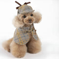 Camel-coloured cotton detective cloak costume for a dog, featuring an adjustable hat.