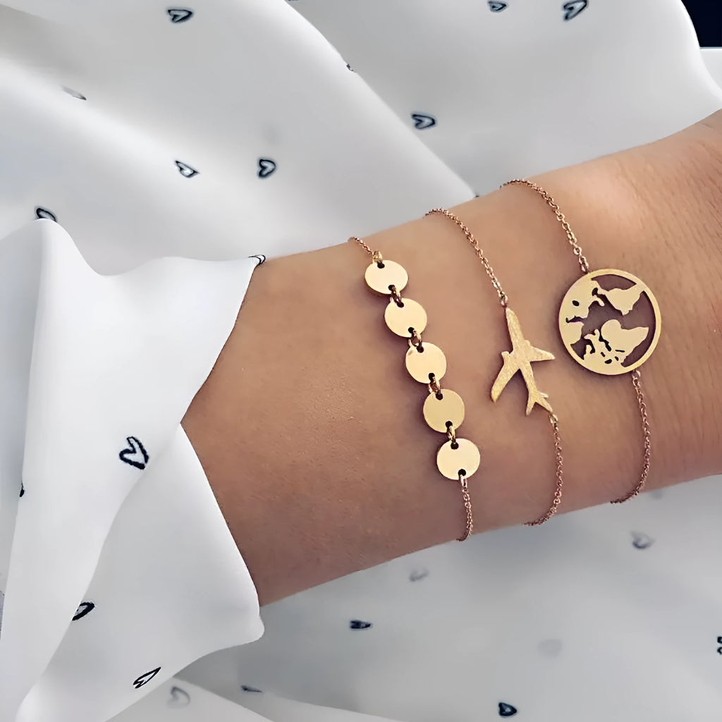 Three women's bracelets with heart-shaped aircraft map charms in bohemian style