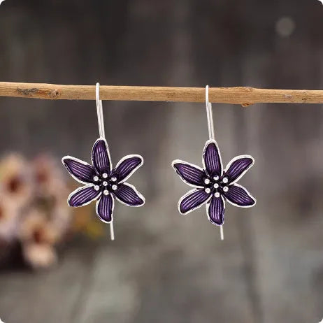 Purple flower-shaped alloy stud earrings with retro design and nickel-free posts