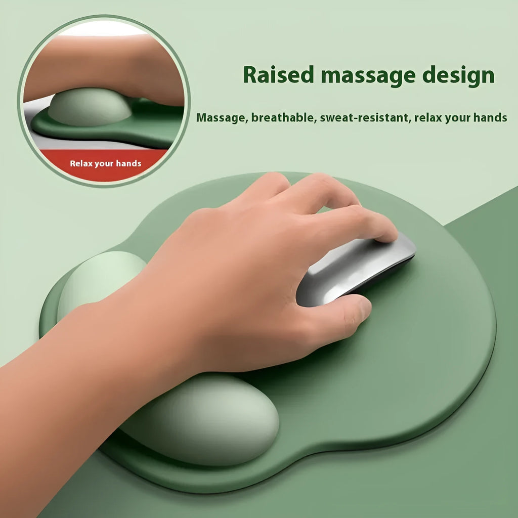 Silicone mouse mat with raised wrist rest in a gradient colour design on a desk.