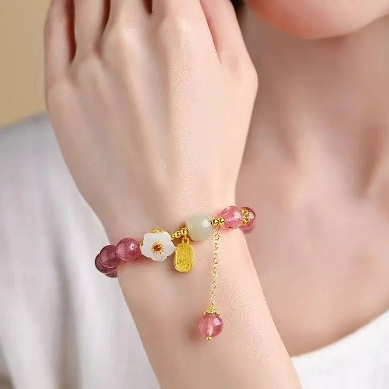 Handmade strawberry quartz crystal bracelet with Hetian jade peach blossom charm for women