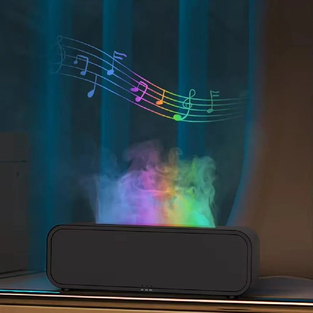 Black and white USB aroma diffuser with remote control and colour-changing lights on a wooden surface