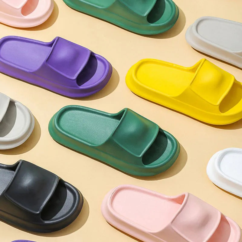 EVA flip-flop slippers with a non-slip sole pattern, shown in multiple colours including black, pink, and white.
