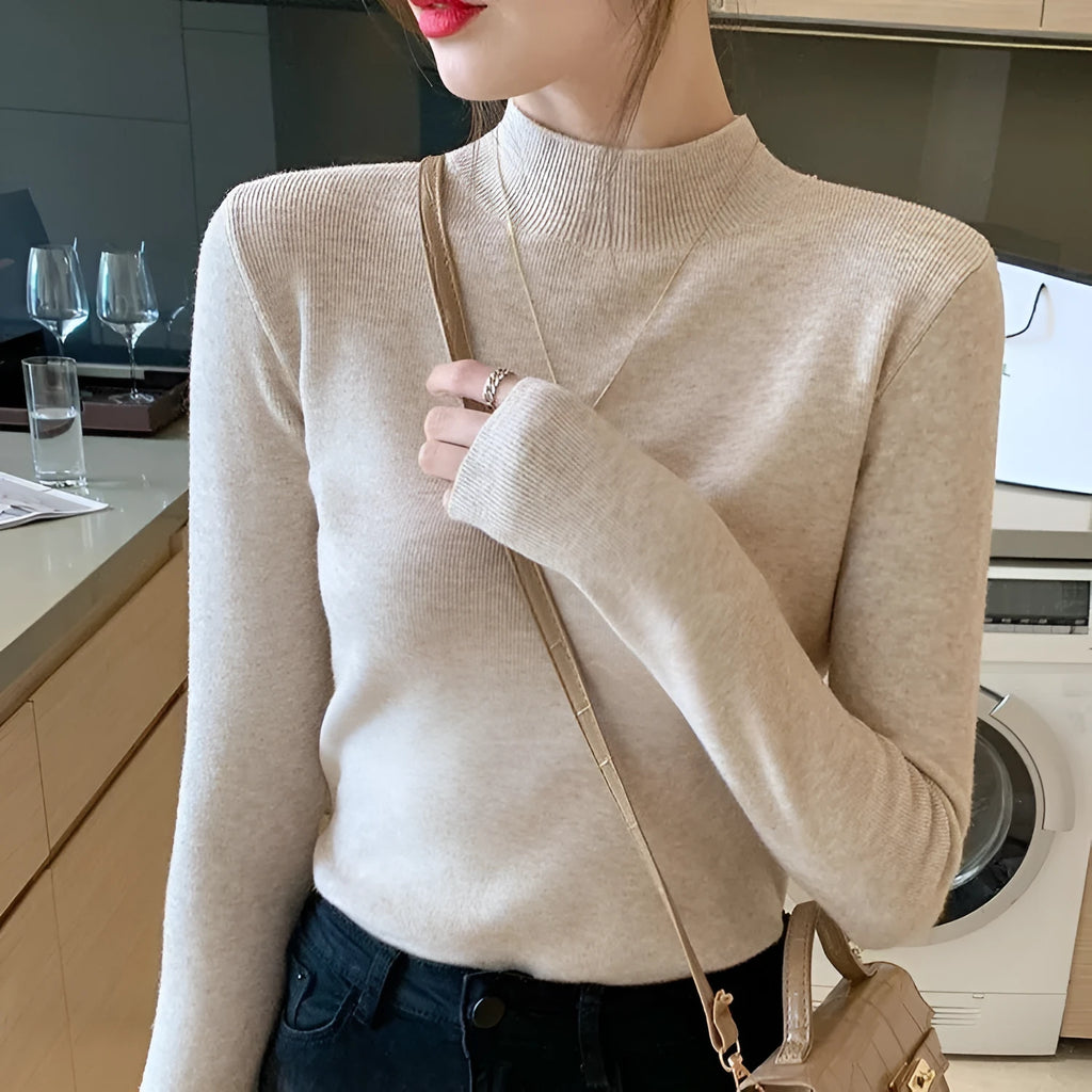 Women's slim fit viscose knitted long sleeve shirt in various colours including apricot, black, and gentle blue.