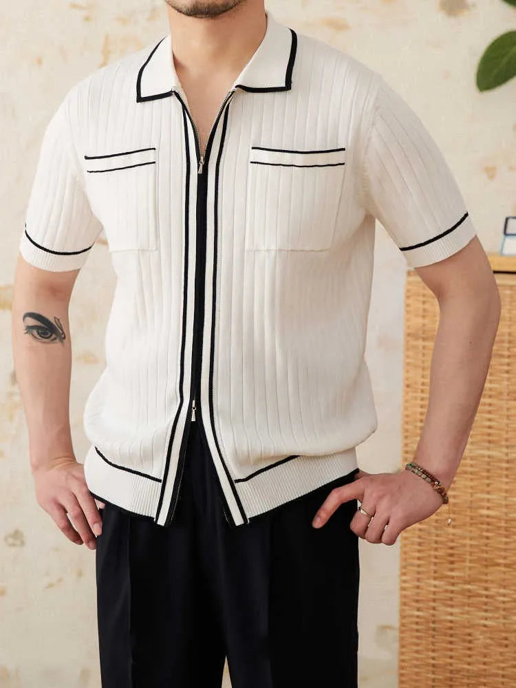 Slim black and white lapel polo shirt with short sleeves on a hanger