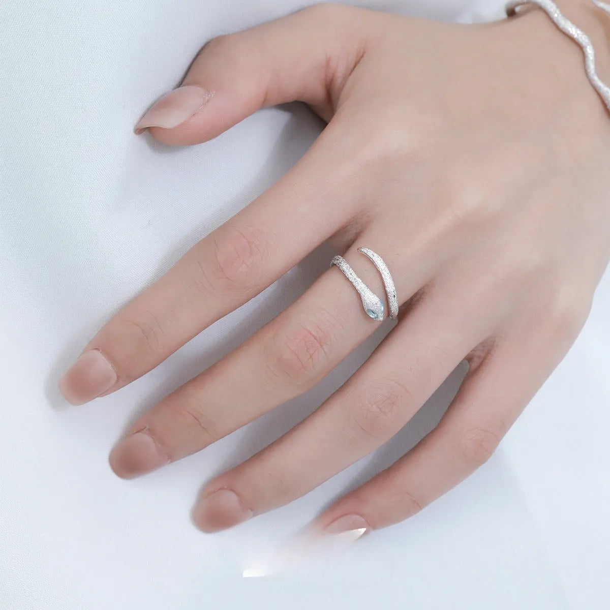 Silver electroplated snake ring with adjustable opening and platinum colour finish