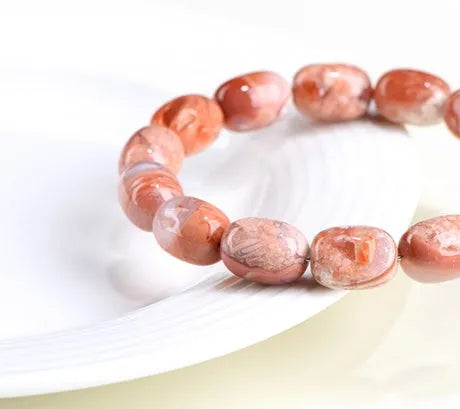 Natural cherry agate barrel bead bracelet with geometric design and ruyi elements
