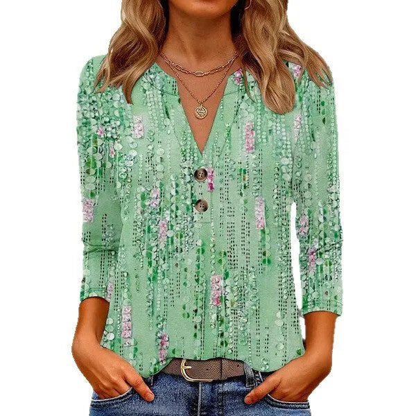Women's loose fit V-neck casual top with a colourful 3D printed pattern on polyester fabric.