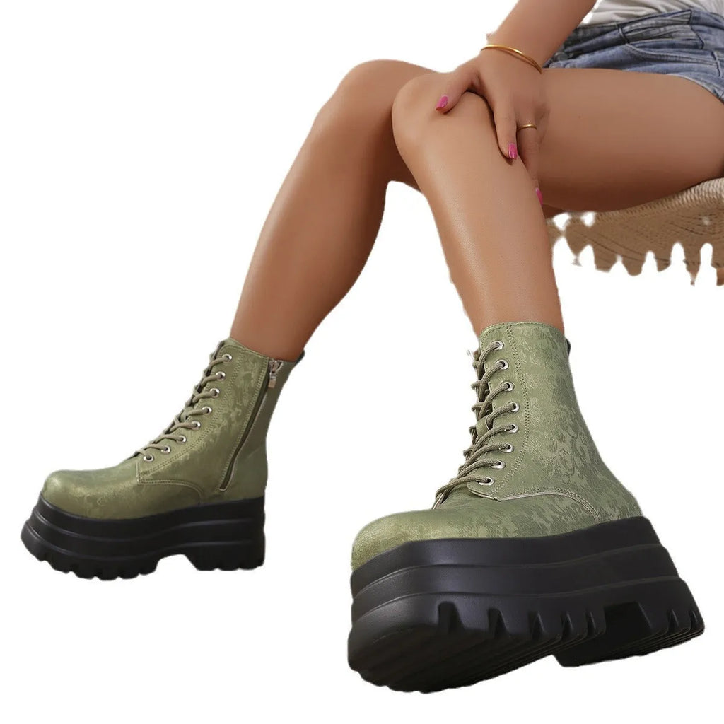 Women's mid-calf platform boots with chunky heel and side zipper in retro patchwork design.