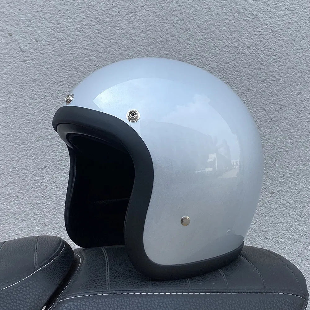 Retro style half motorcycle helmet in glass fibre construction for electric bike commuting