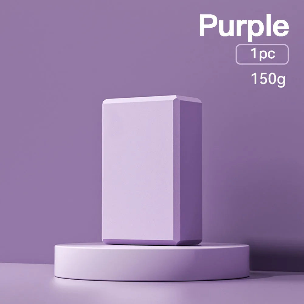 EVA foam yoga blocks in four colours showing hexagonal facets and ridge grip details