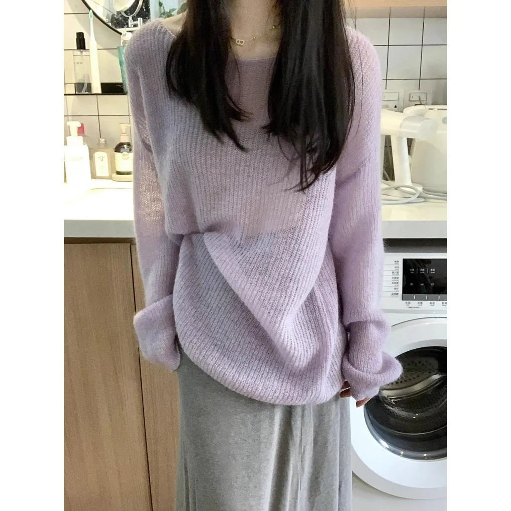 Purple sleeveless blouse with round neck and hollow out detailing on lightweight ice silk fabric