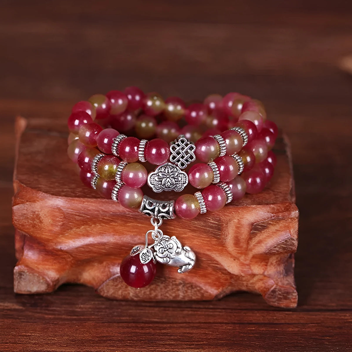 Handmade watermelon crystal bracelet with Chinese knot and elephant beads in 6mm or 8mm size.