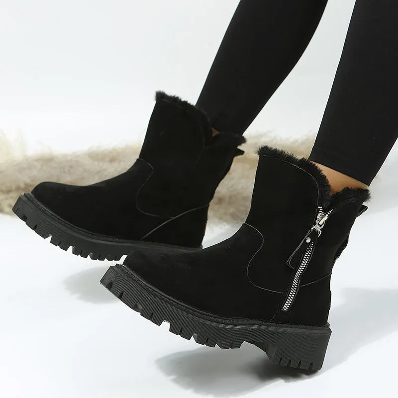 Women's black high-top plush snow boots with a side zipper and thick rubber sole