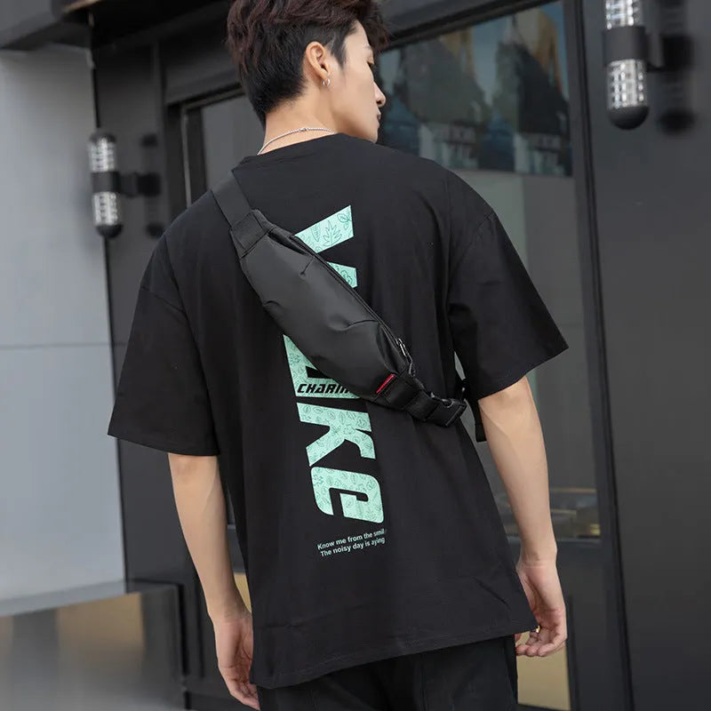 Black Oxford cloth men's single shoulder crossbody bag showing phone pocket and zipper compartments