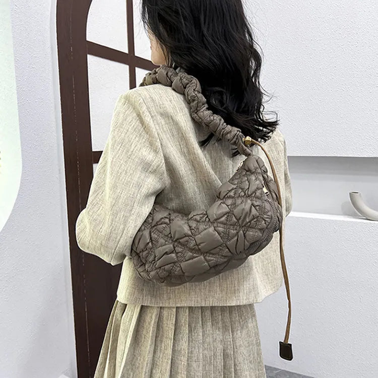 Women's casual nylon shoulder messenger bag in a solid colour with adjustable strap.