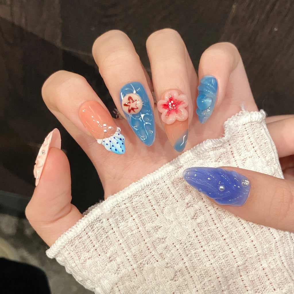 Three-dimensional carved jellyfish design wearable armour in almond nail colour with rose and tulip patterns