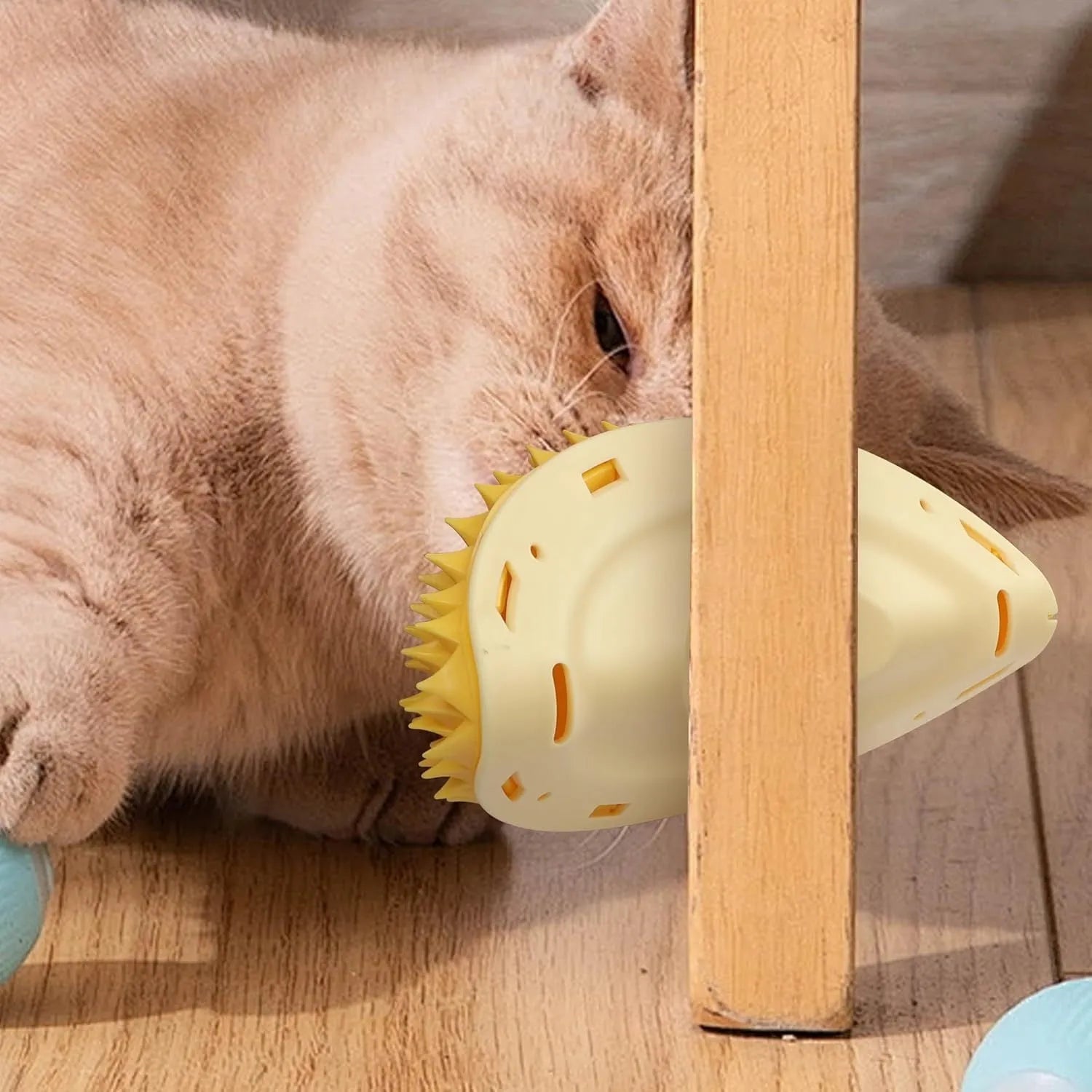 Yellow durian-shaped cat corner scratcher with massage comb and catnip powder