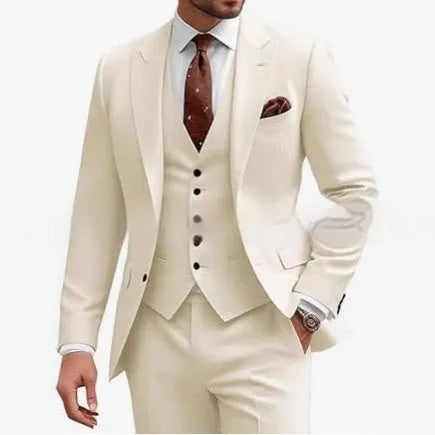 Man wearing a bright red slim fit three-piece suit with waistcoat, suitable for a wedding or business event.