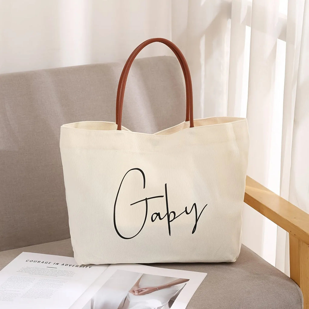 Beige white canvas tote bag with 40 litre capacity and double handles