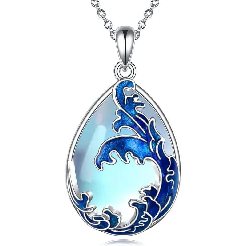 Blue heart-shaped alloy pendant on a necklace chain.