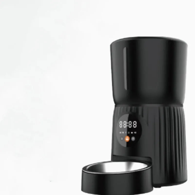 Black and white automatic pet feeder with food storage hopper and USB power connection