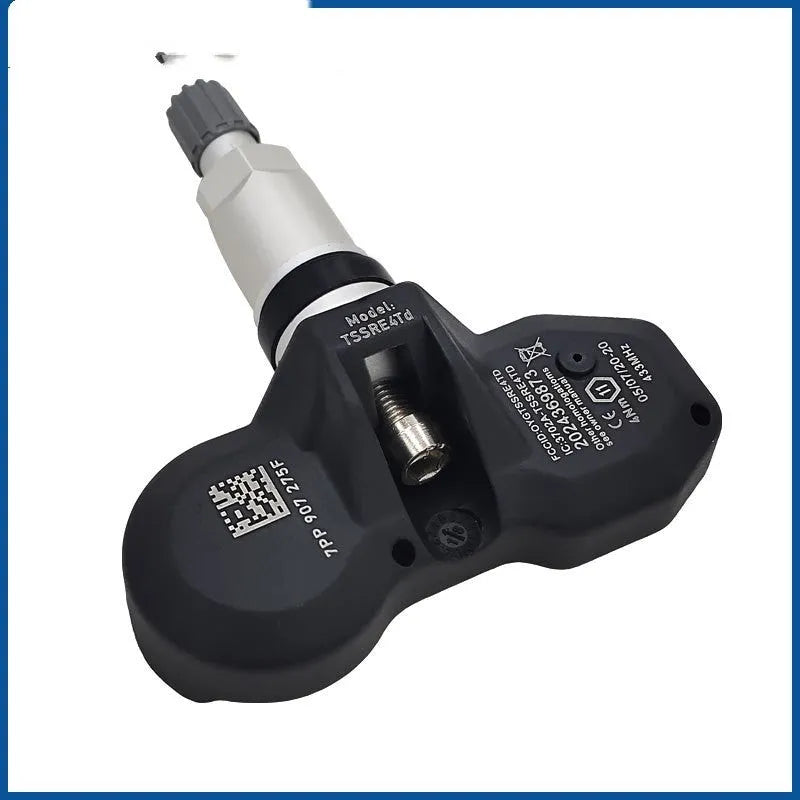 Black Audi tyre pressure monitor TPMS sensor replacement unit