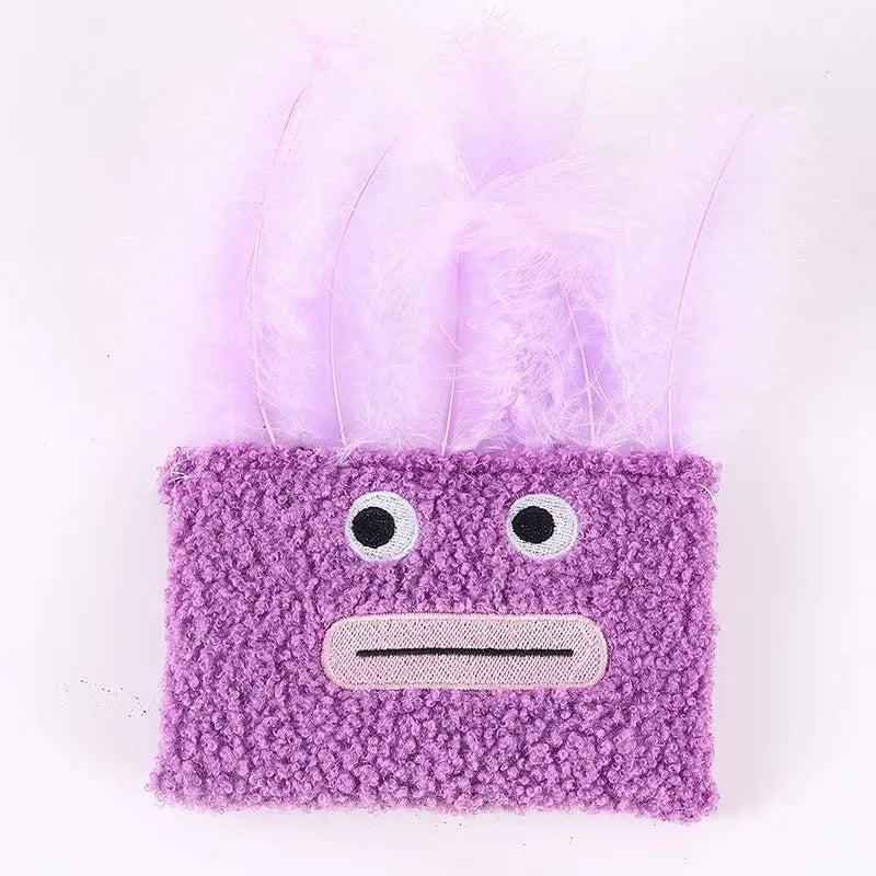 Colourful catnip plush toy shaped like an exploding head with a big open mouth