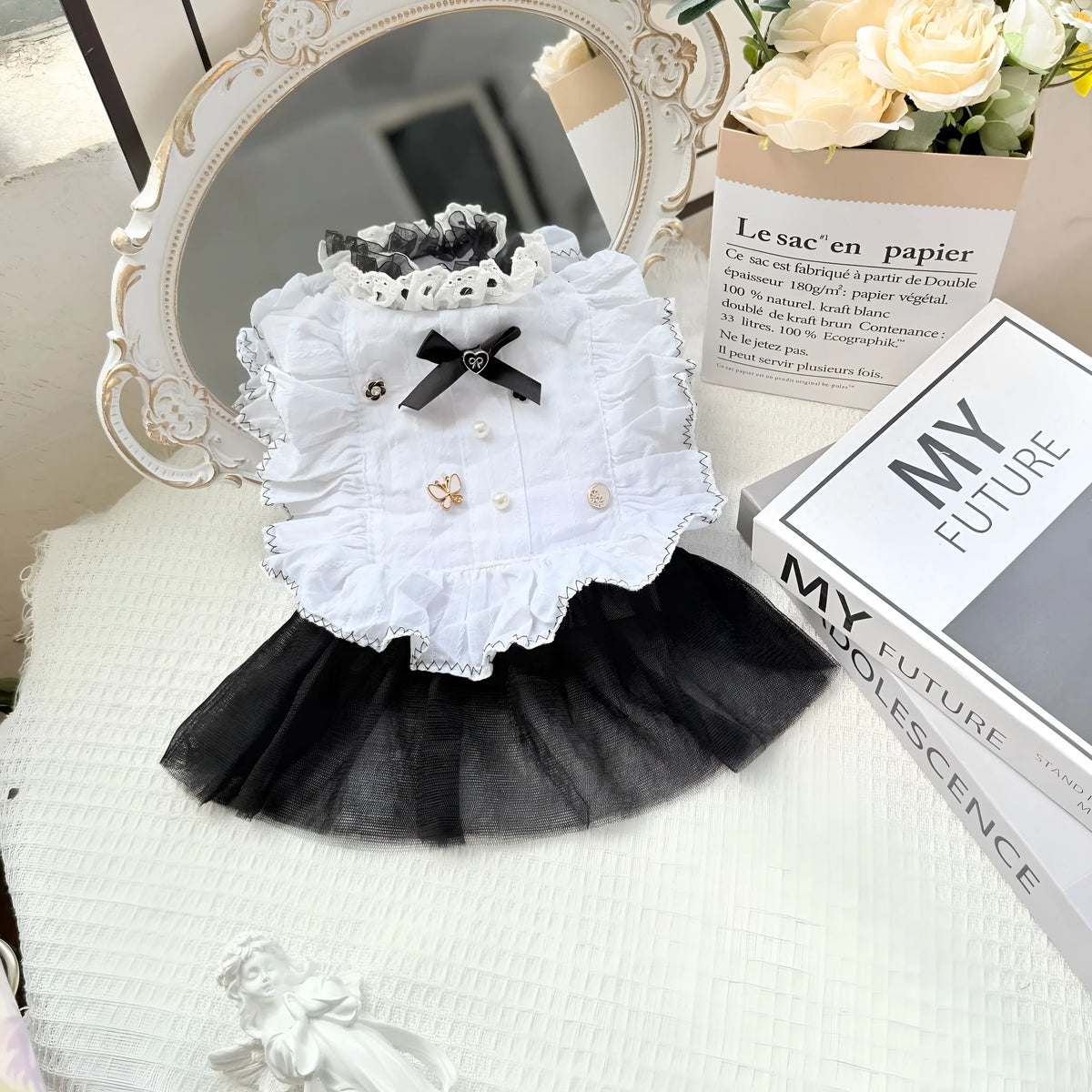 White polyester dog dress with a layered gauze skirt, shown on a small dog.
