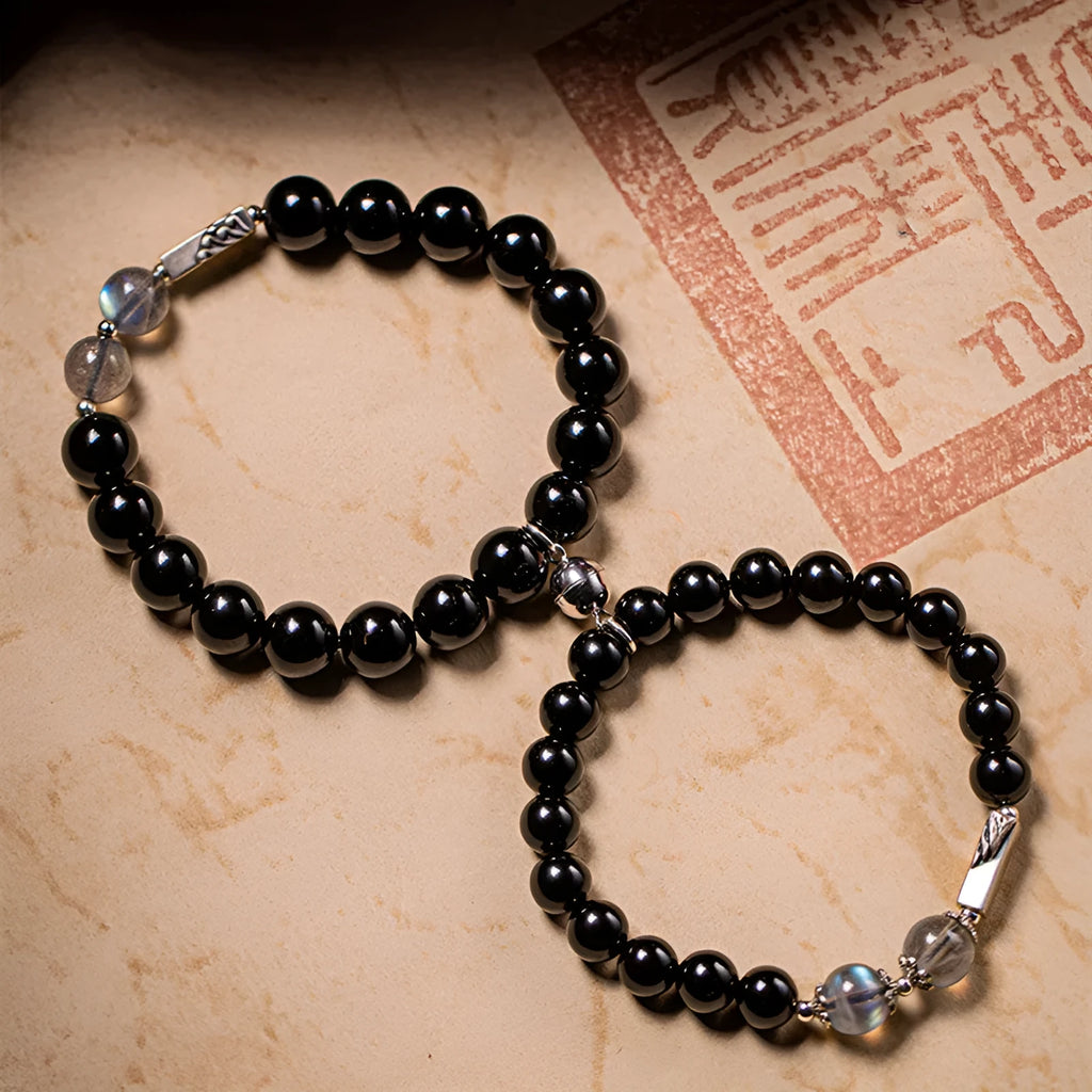 Black obsidian bead bracelets showing 8mm and 10mm sizes for couples in national style