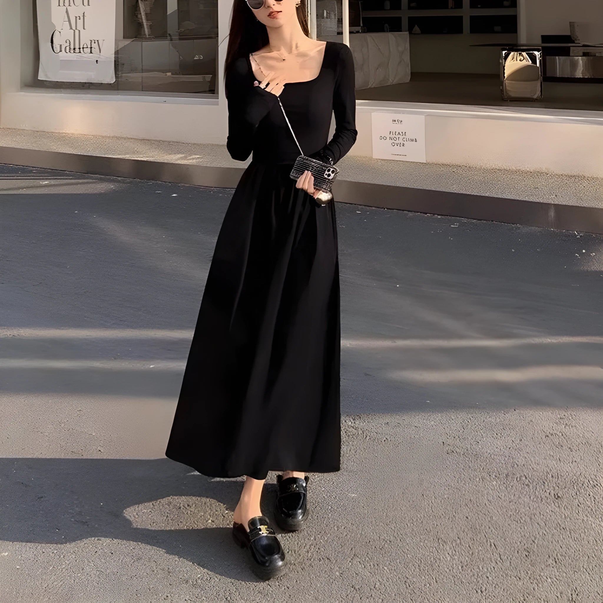 Black square collar knitted dress with elastic waist and A-line skirt