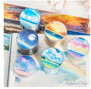 Roll of 30mm wide sky-themed Japanese paper washi tape showing colourful cloud design