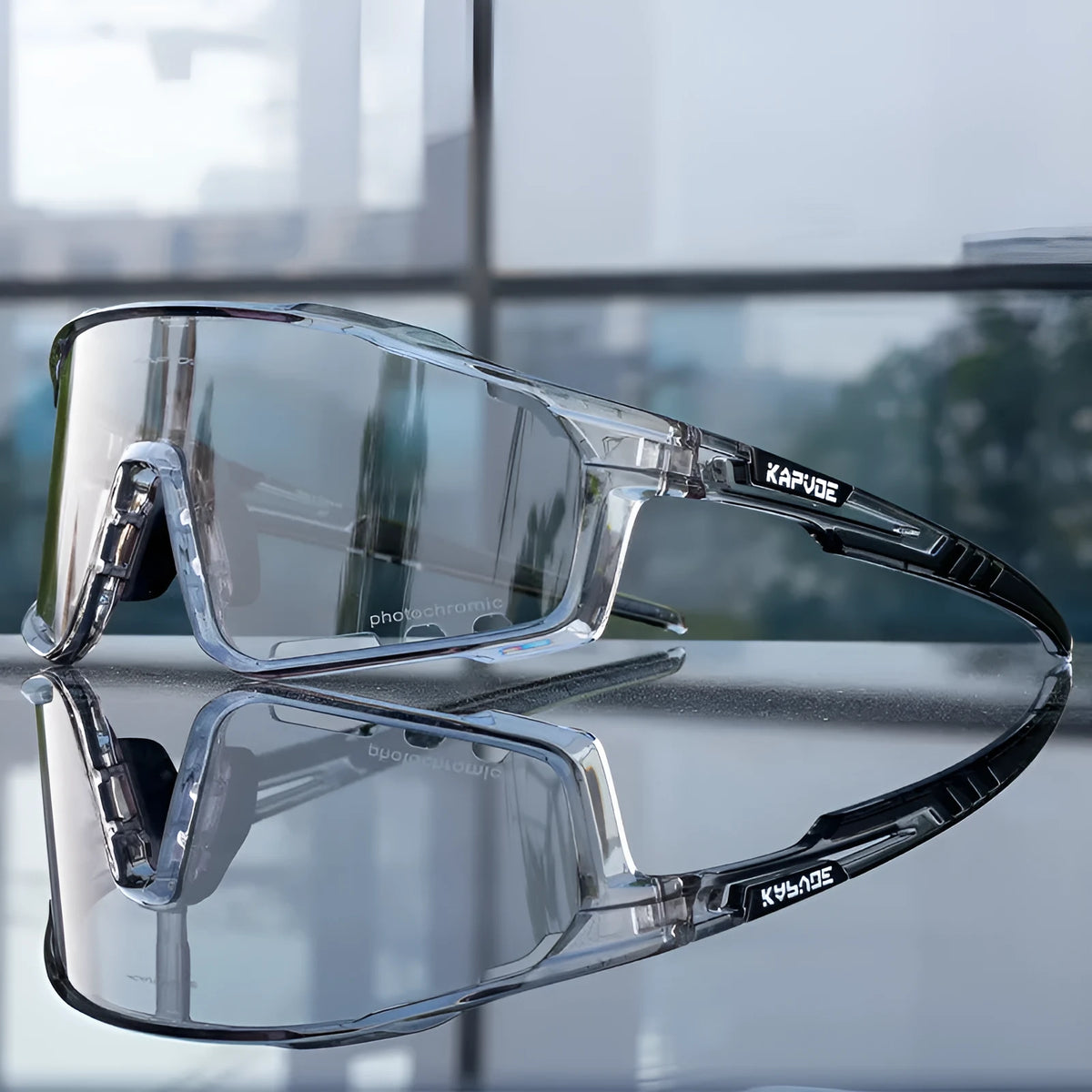 Semi-rimless photochromic cycling goggles with TR90 frame on a bicycle helmet.