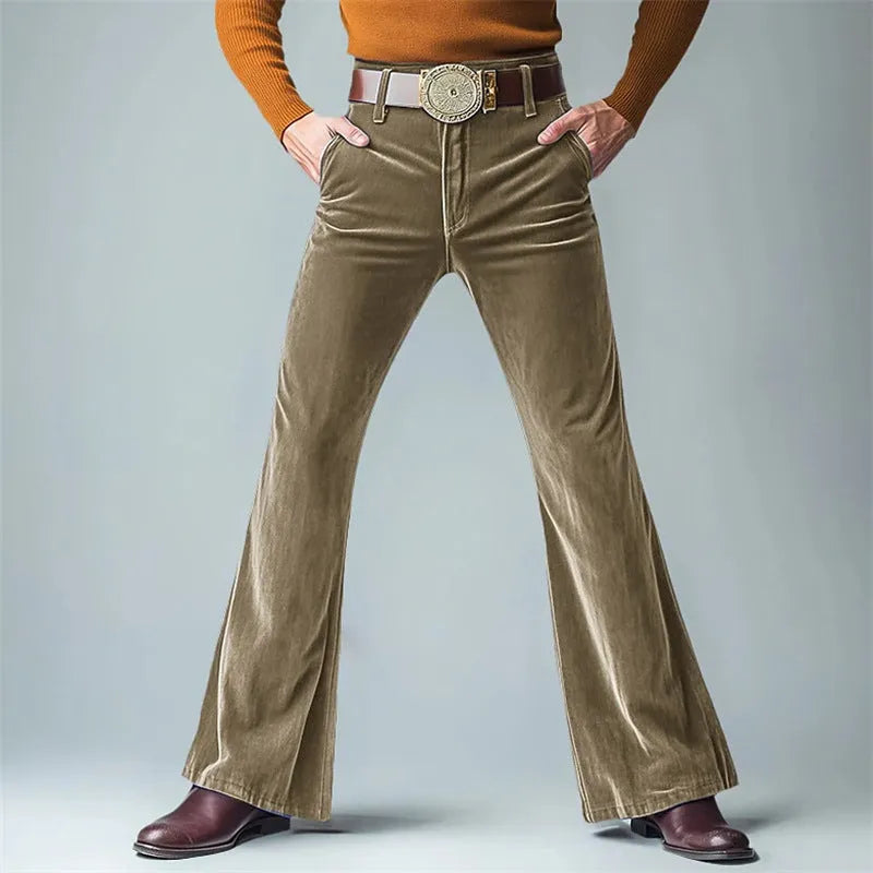 Man wearing slim-fit gold velvet flared suit pants in a solid colour, suitable for banquet or formal casual wear.